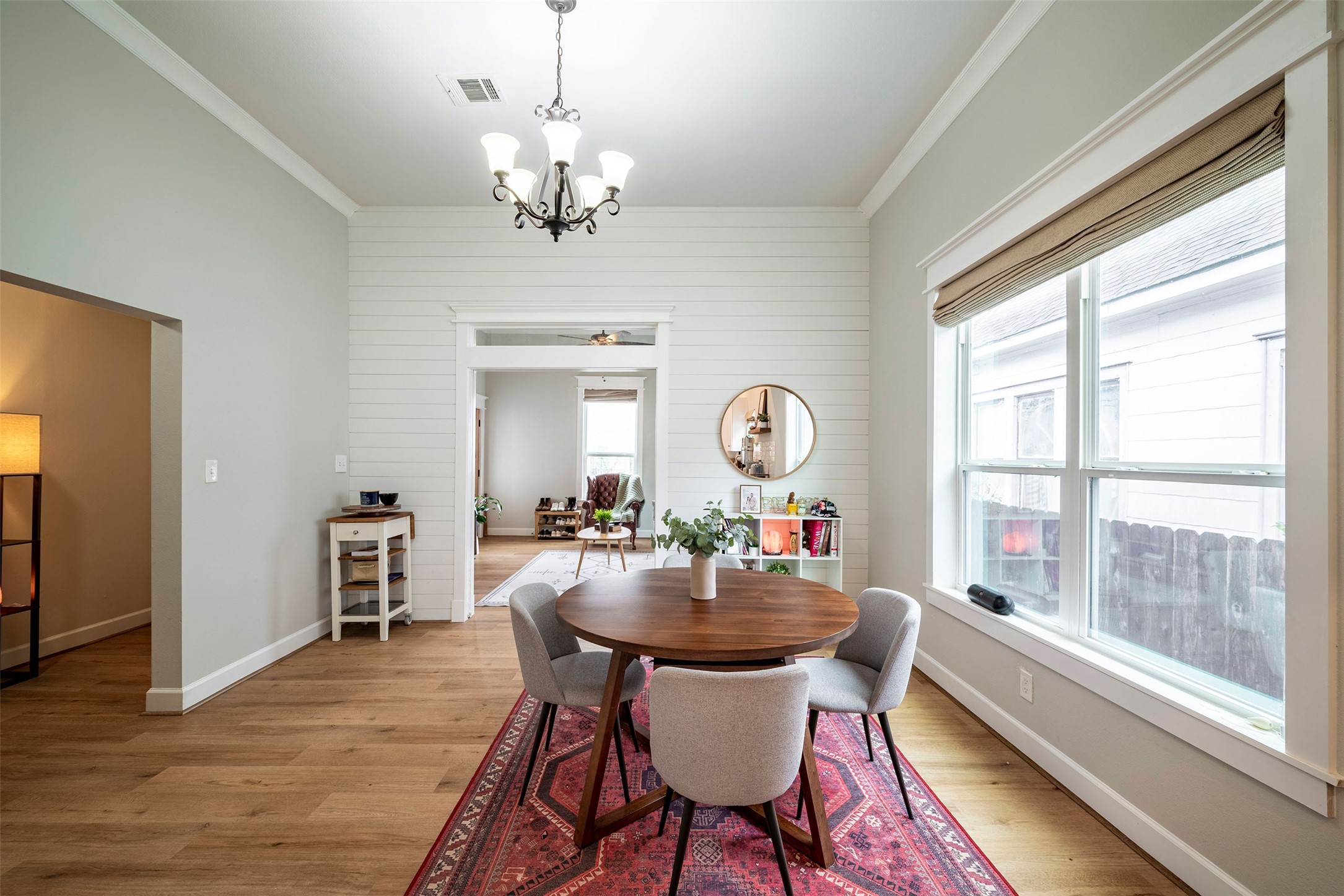 1924 Gano Street Houston, TX 77009 - Photo 8 of 18 a view of a dining room with furniture window and wooden floor