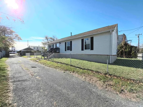 a house view with a backyard space