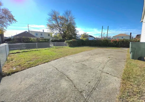 a view of a lake with a yard