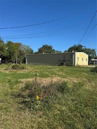 a view of a yard with an outdoor space