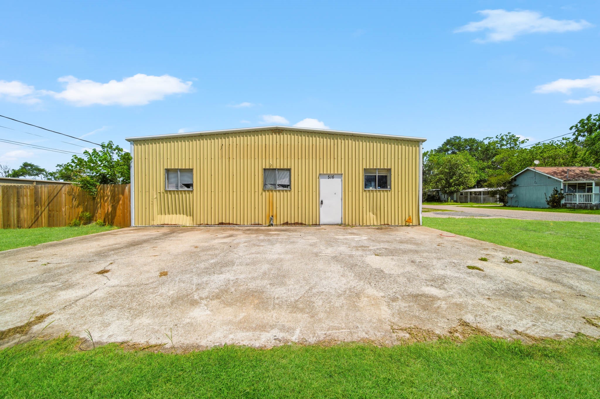 516 Cedar Bayou Road Baytown, TX 77520 - Photo 2 of 16 a view of outdoor space with garden