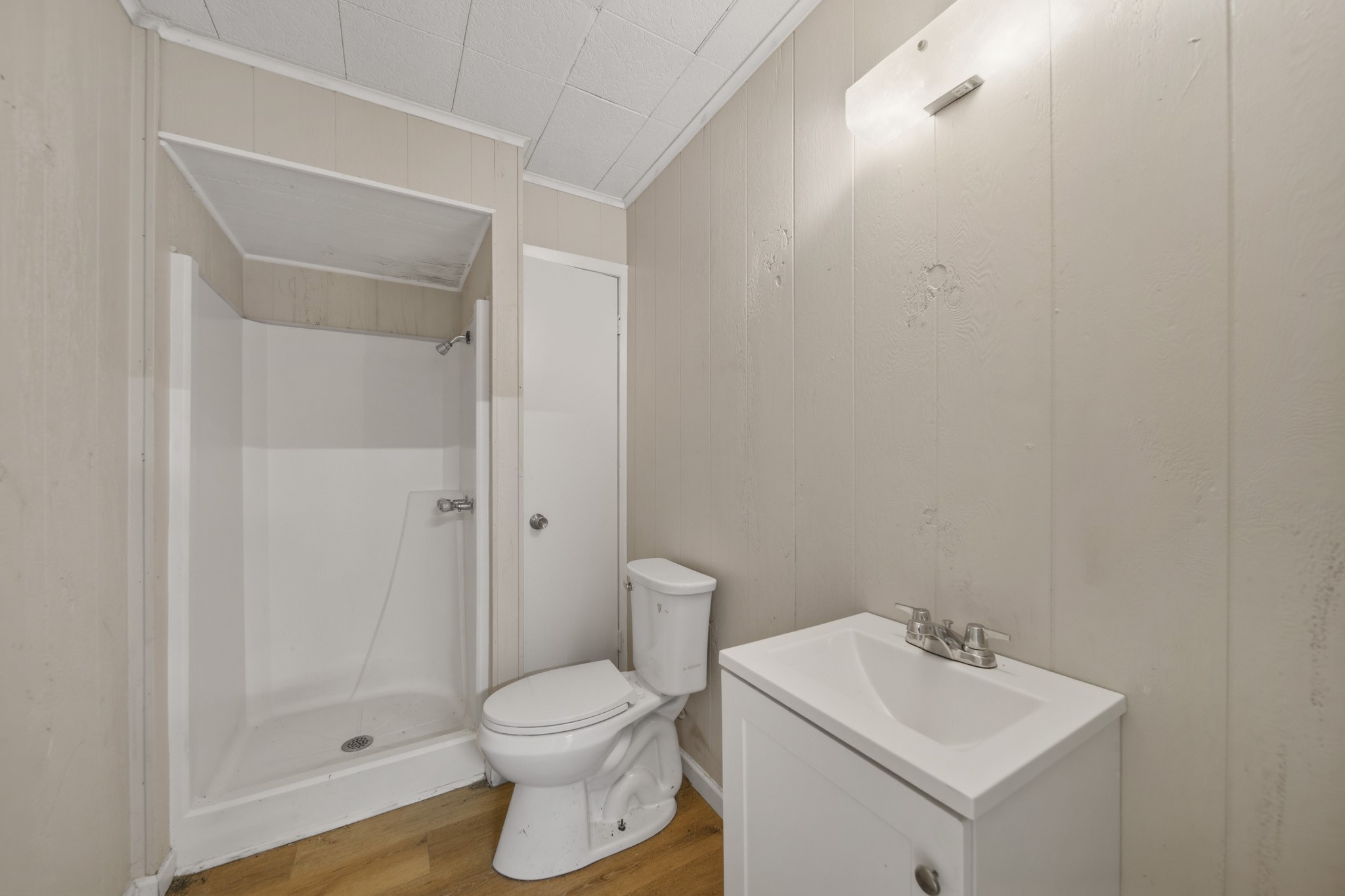 516 Cedar Bayou Road Baytown, TX 77520 - Photo 7 of 16 a bathroom with a toilet sink and shower