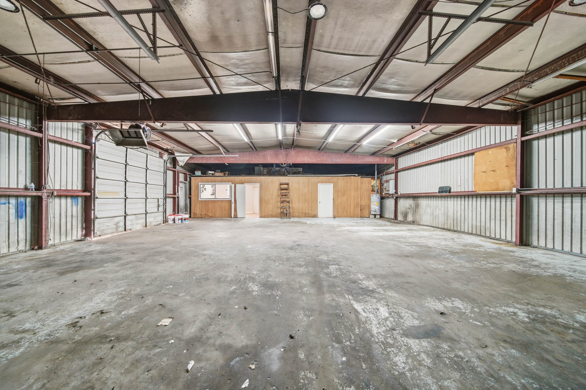 516 Cedar Bayou Road Baytown, TX 77520 - Photo 9 of 16 a view of an empty room with a garage
