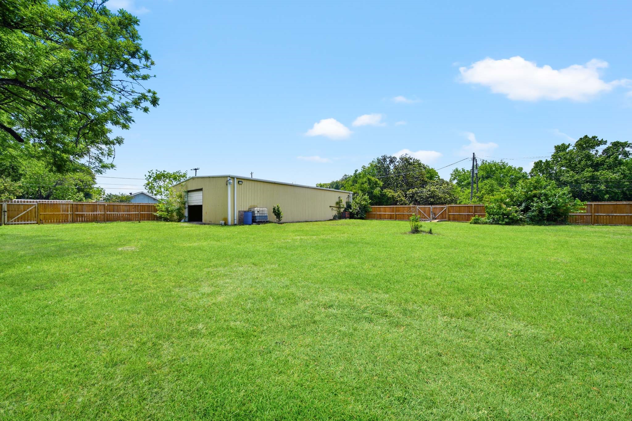 516 Cedar Bayou Road Baytown, TX 77520 - Photo 10 of 16 a front view of a house with garden