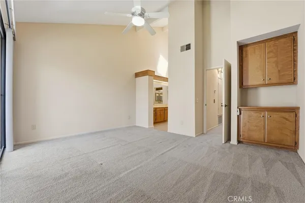 a view of a kitchen with an empty room