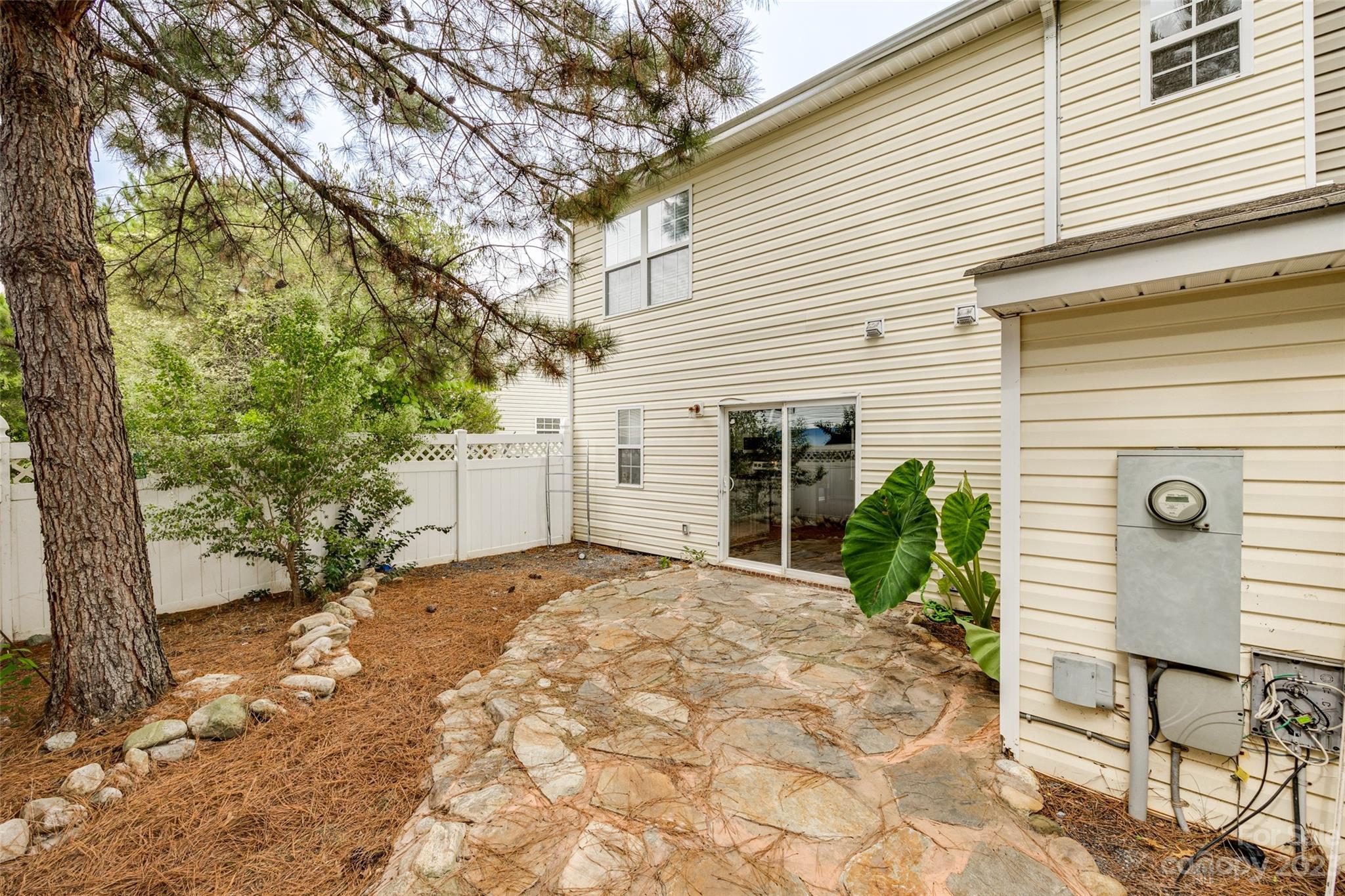 413 Caddy Street Fort Mill, SC 29715 - Photo 23 of 26 a backyard of a house with seating space