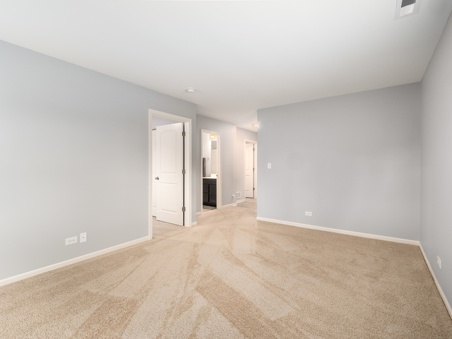 2421 Upland Road Pingree Grove, IL 60140 - Photo 17 of 21 a view of an empty room