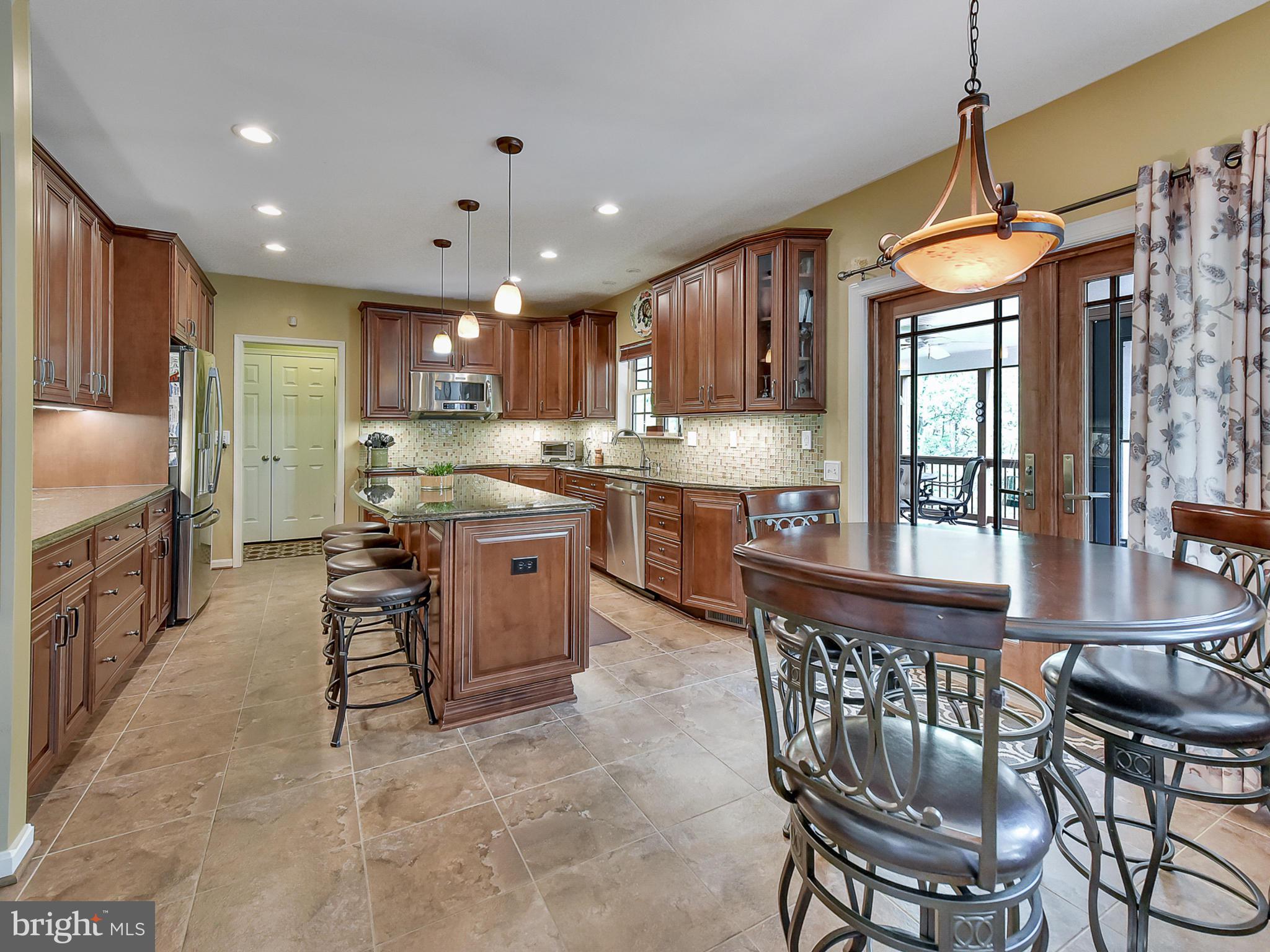 6405 Spring Forest Road Frederick, MD 21701 - Photo 12 of 68 Gourmet kitchen boasts tiled floor, granite!