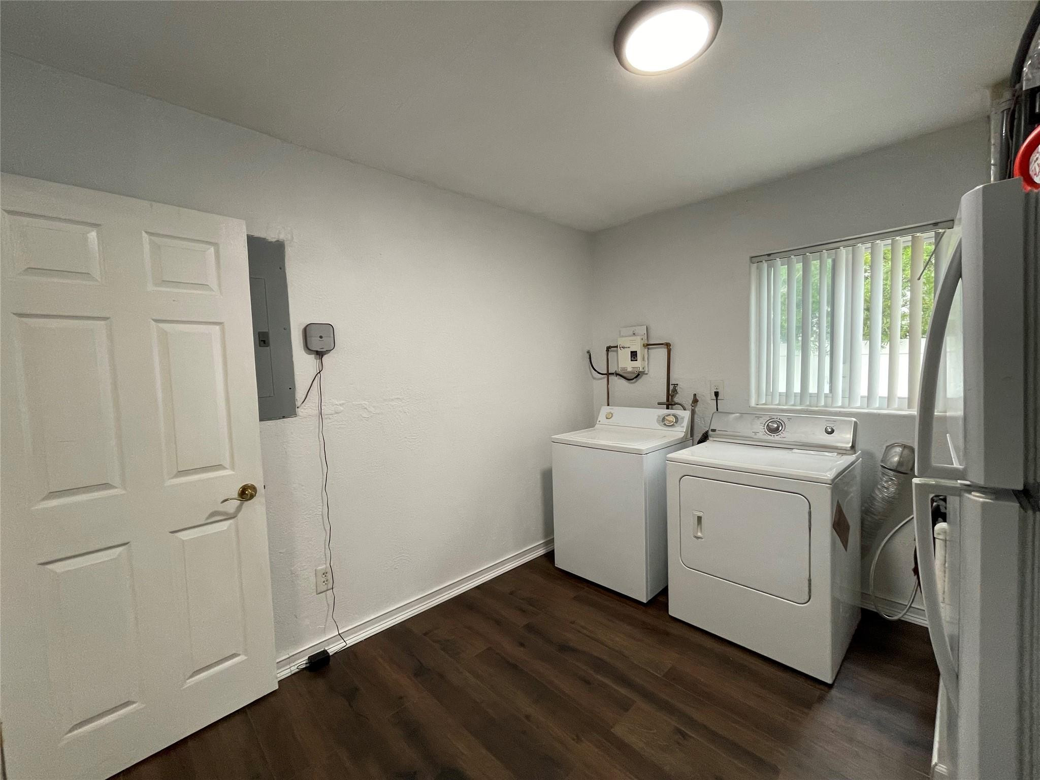 3231 Northeast 27th Terrace Lighthouse Point, FL 33064 - Photo 22 of 30 a utility room with dryer and washer