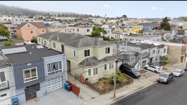 an aerial view of multiple houses