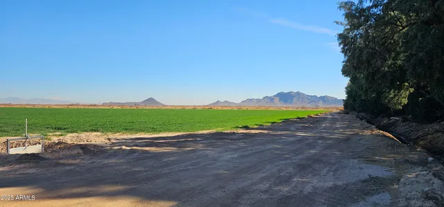 a view of a lake with mountain in the background