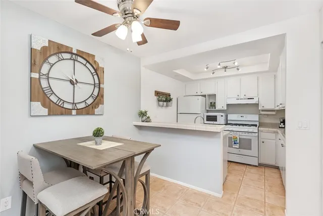 a large bedroom with a large bed and a large window