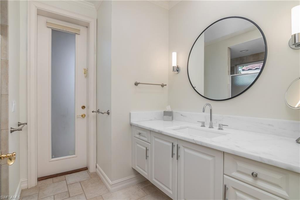 938 Spanish Moss Trail Naples, FL 34108 - Photo 29 of 43 Ensuite to Guest Bedroom 3 and to Pool