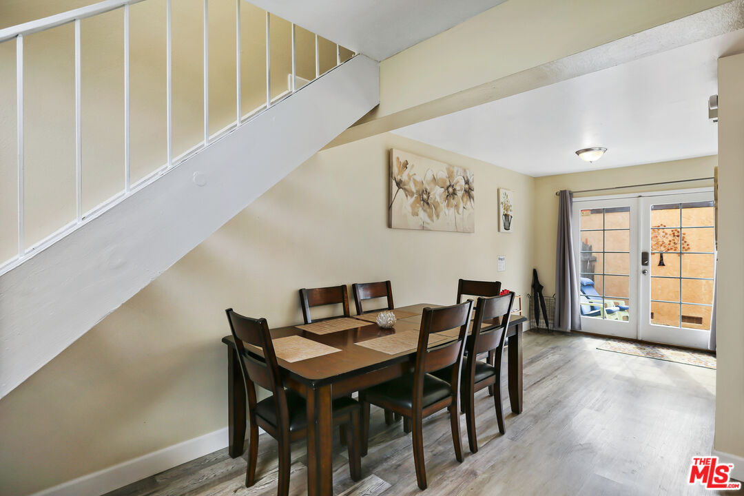 3519 Polk Street Riverside, CA 92505 - Photo 12 of 28 a view of a dining room with furniture and wooden floor