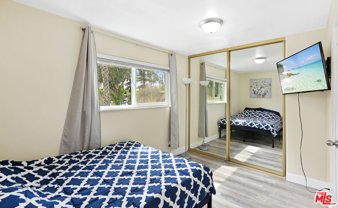 3519 Polk Street Riverside, CA 92505 - Photo 19 of 28 a bedroom with a bed and a window