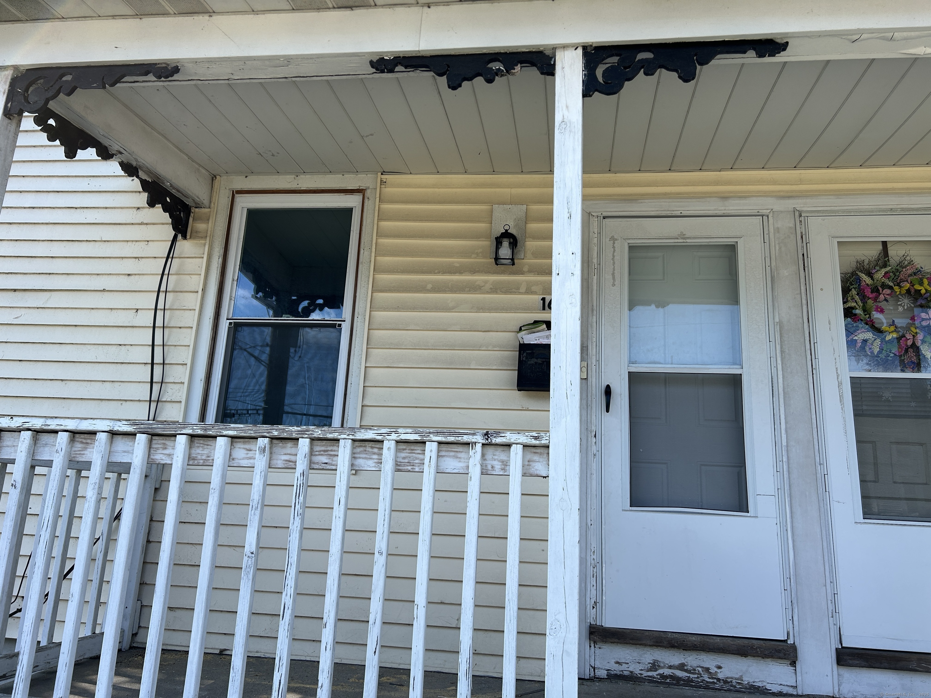 164 Central Avenue Norwich, CT 06360 - Photo 2 of 16 a view of front door