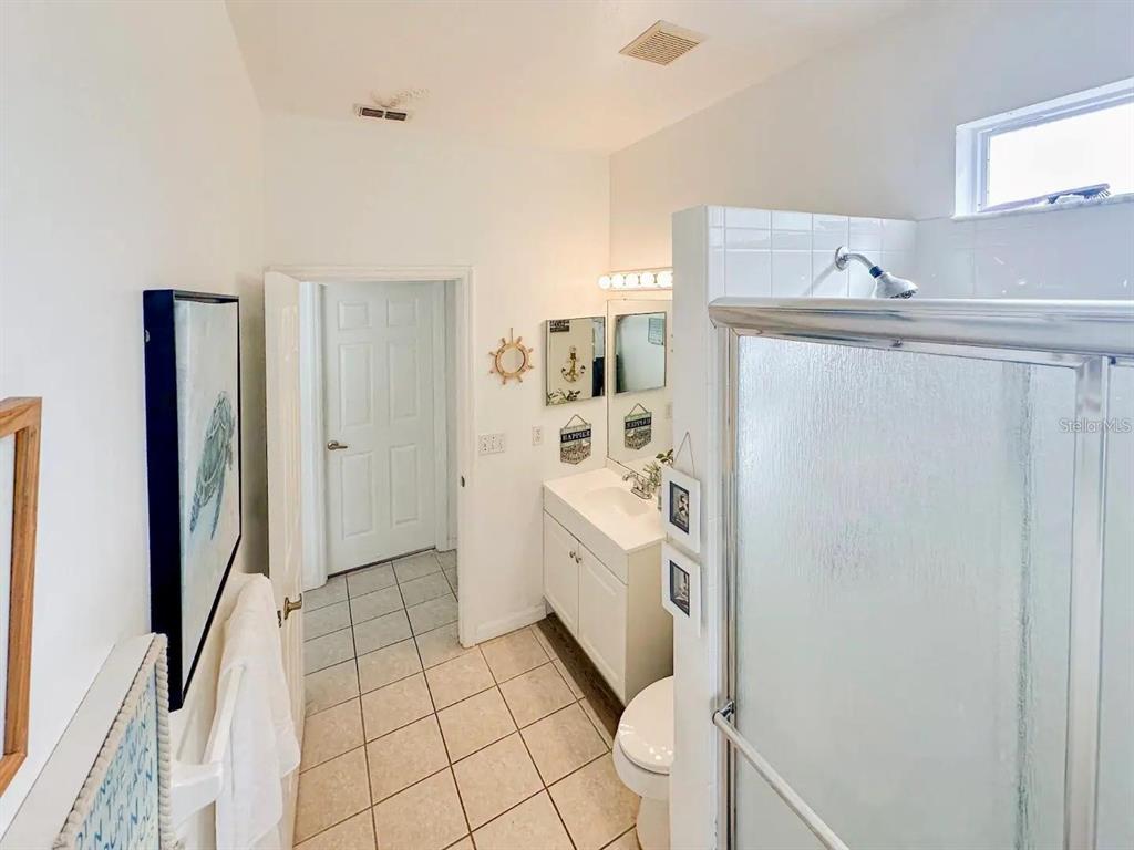 344 Grosvenor Loop Davenport, FL 33897 - Photo 10 of 27 a room with a washer and dryer