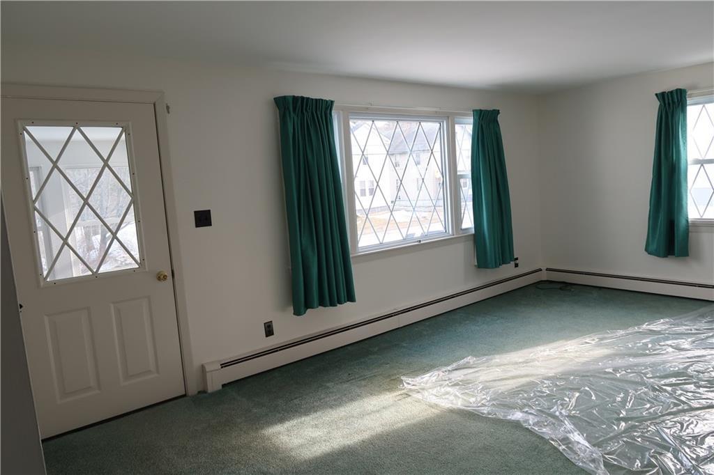 42 Townsend Road Augusta, ME 04330 - Photo 11 of 22 Large LR has hardwood floors under...