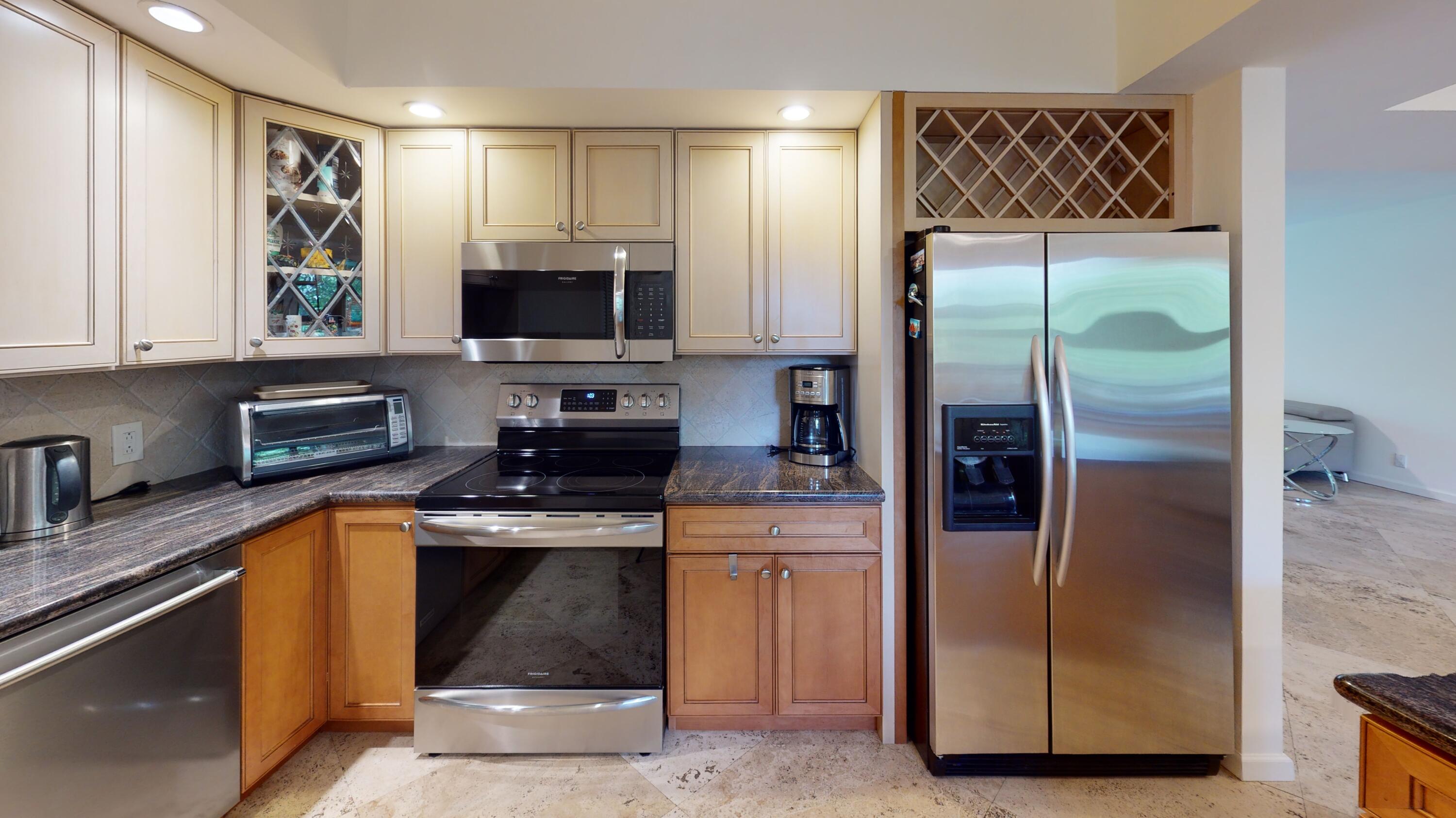 277 North Ocean Boulevard, Unit 2020 Boca Raton, FL 33432 - Photo 13 of 33 a kitchen with a refrigerator sink and microwave