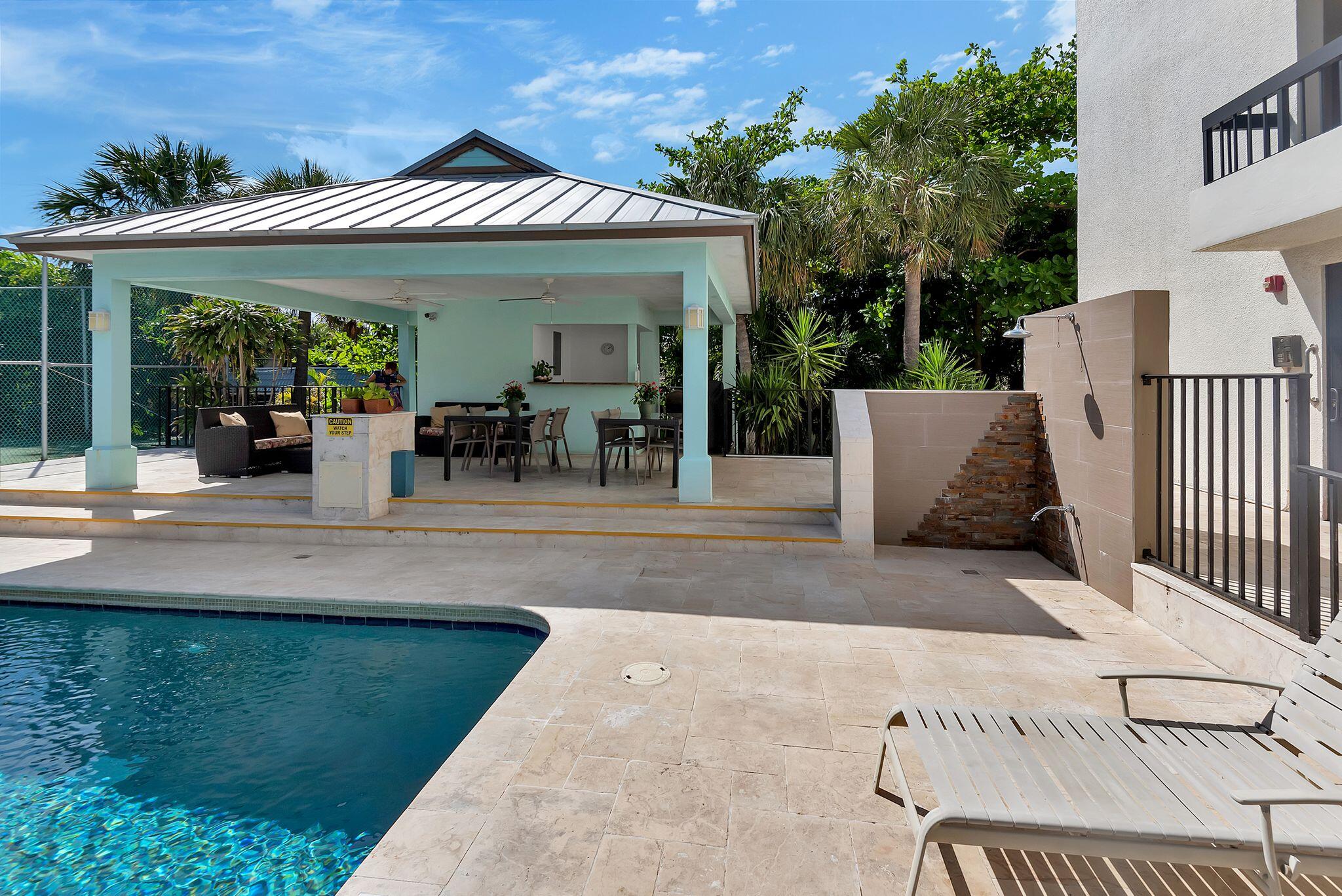 277 North Ocean Boulevard, Unit 2020 Boca Raton, FL 33432 - Photo 26 of 33 a view of a house with porch and furniture