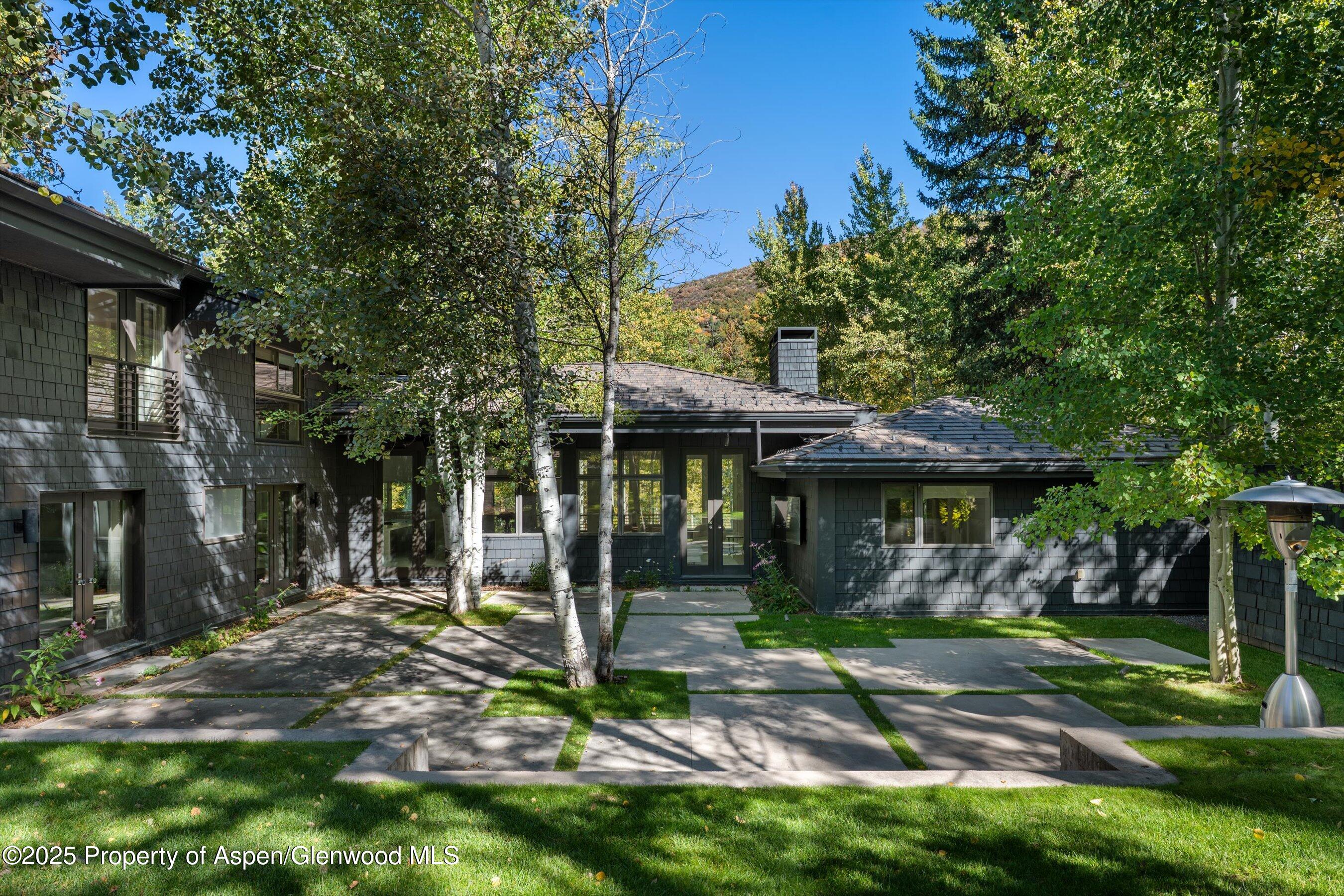 1220 Red Butte Drive Aspen, CO 81611 - Photo 26 of 27 a view of a house with backyard
