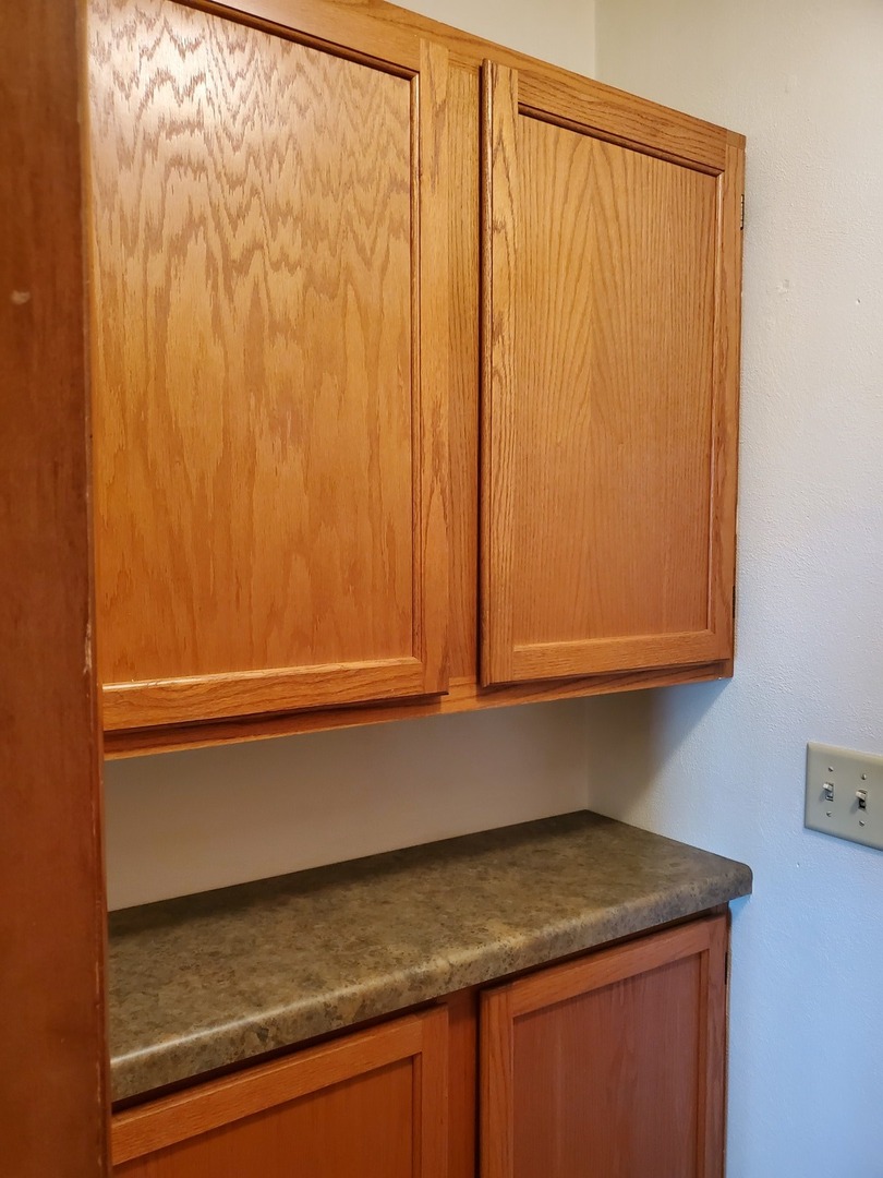 730 North 2853rd Road Utica, IL 61373 - Photo 14 of 23 a bathroom with a granite countertop sink and a mirror