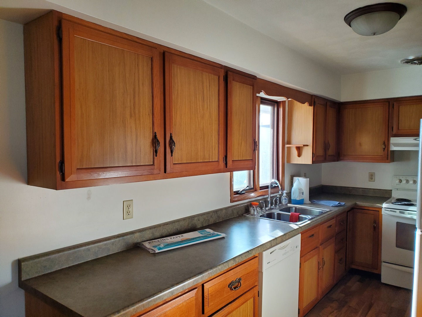 730 North 2853rd Road Utica, IL 61373 - Photo 5 of 23 a kitchen with stainless steel appliances granite countertop a sink stove and cabinets