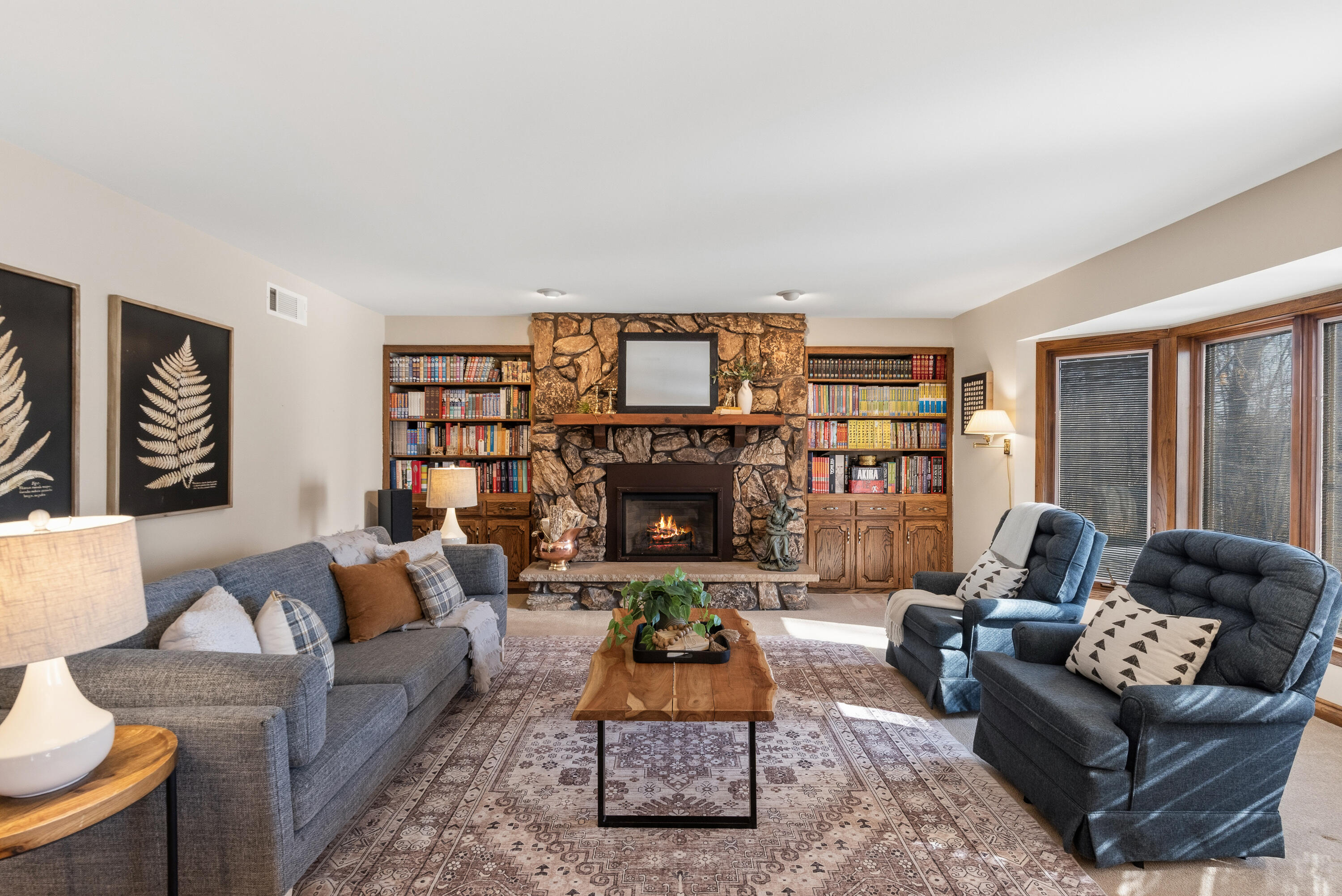 12785 West Bobwood Road New Berlin, WI 53151 - Photo 2 of 39 Gas Fireplace, Bookshelves and Built-ins. Open concept to the kitchen.