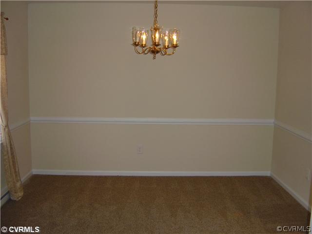 10240 Greglynn Road North Chesterfield, VA 23236 - Photo 7 of 15 Dining Room - Chair molding and chandelier

