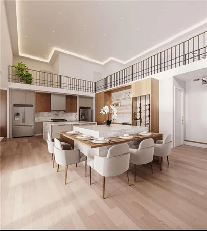 a living room with furniture a fireplace and a table