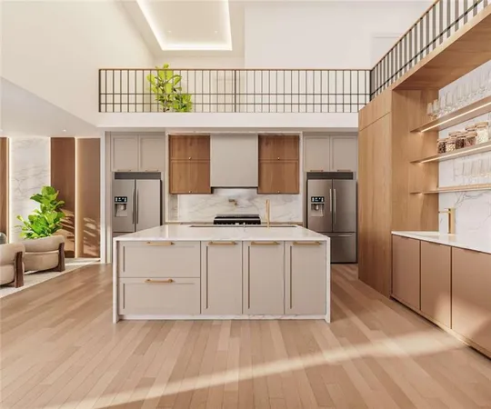 a kitchen that has a lot of cabinets in it and wooden floor