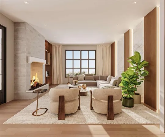 a living room with furniture potted plant and window