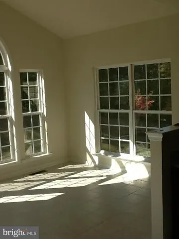 a view of a house with a large window