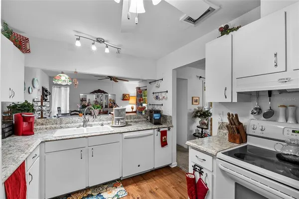 a kitchen with a sink and cabinets