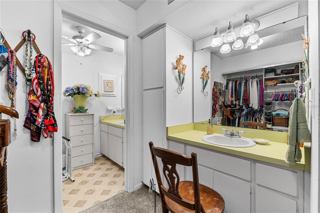 6642 Trail Ridge Drive, Unit 6642 Lakeland, FL 33813 - Photo 19 of 39 a view of a dining area with chandelier