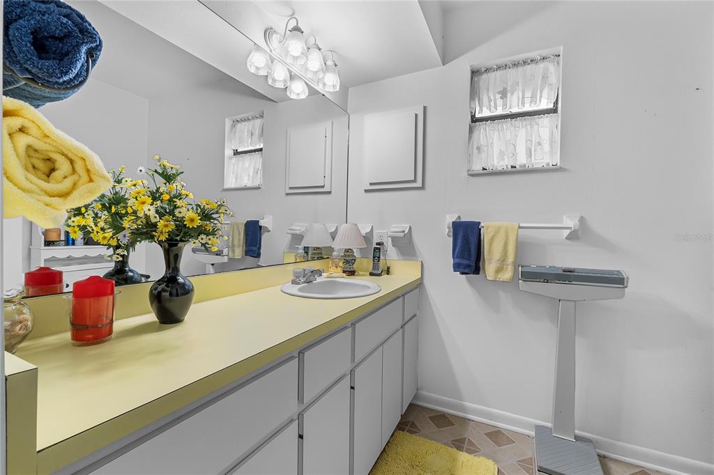 6642 Trail Ridge Drive, Unit 6642 Lakeland, FL 33813 - Photo 24 of 39 a kitchen with a sink and a stove