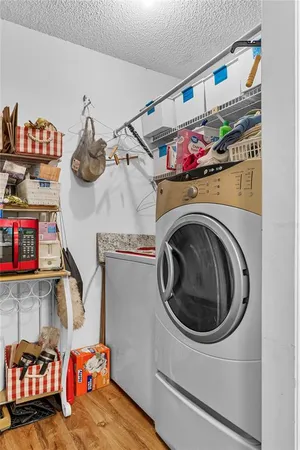 a utility room with dryer and washer