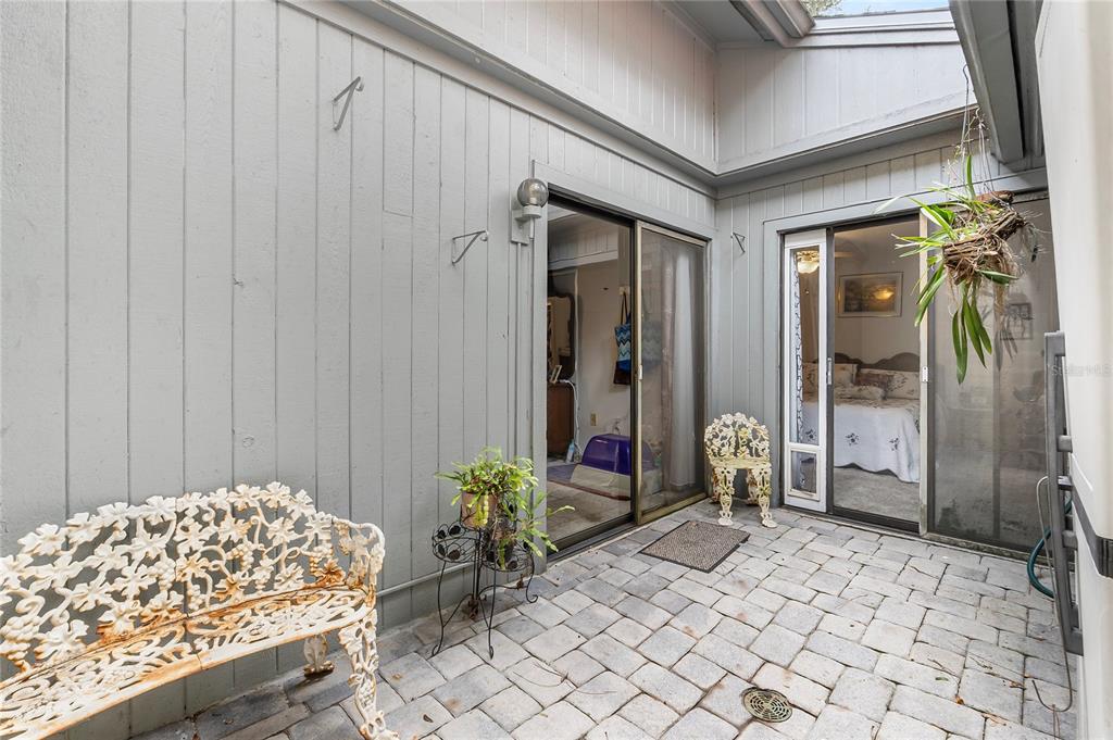 6642 Trail Ridge Drive, Unit 6642 Lakeland, FL 33813 - Photo 29 of 39 a bedroom with a bed and a table in it