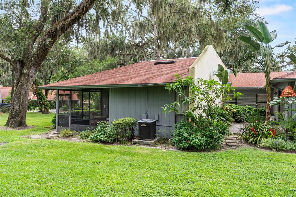 6642 Trail Ridge Drive, Unit 6642 Lakeland, FL 33813 - Photo 34 of 39 a front view of a house with garden