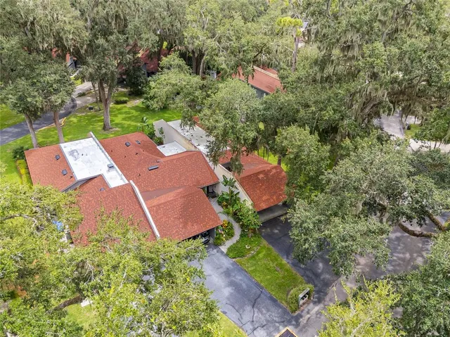 an aerial view of residential house with outdoor space and swimming pool