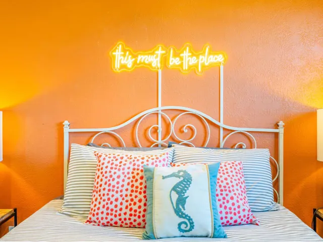 a bathroom with a shower curtain and a sink