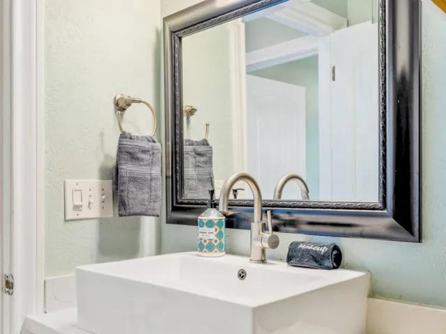 a bathroom with a bathtub and shower