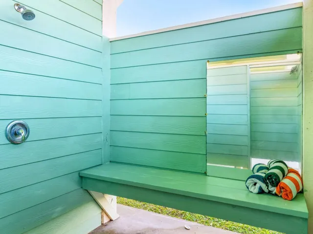 a front view of a building with garden