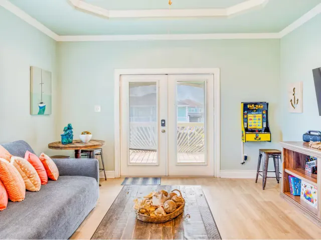 a kitchen with stainless steel appliances granite countertop a stove and a microwave oven