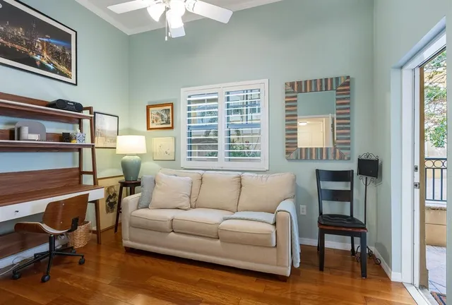 a living room with furniture and a window