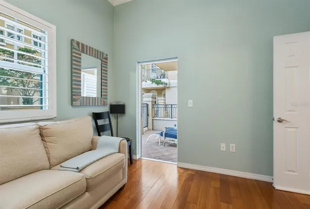 a living room with furniture and a window