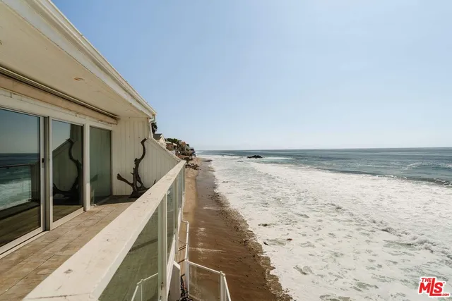 a view of a house with a plant