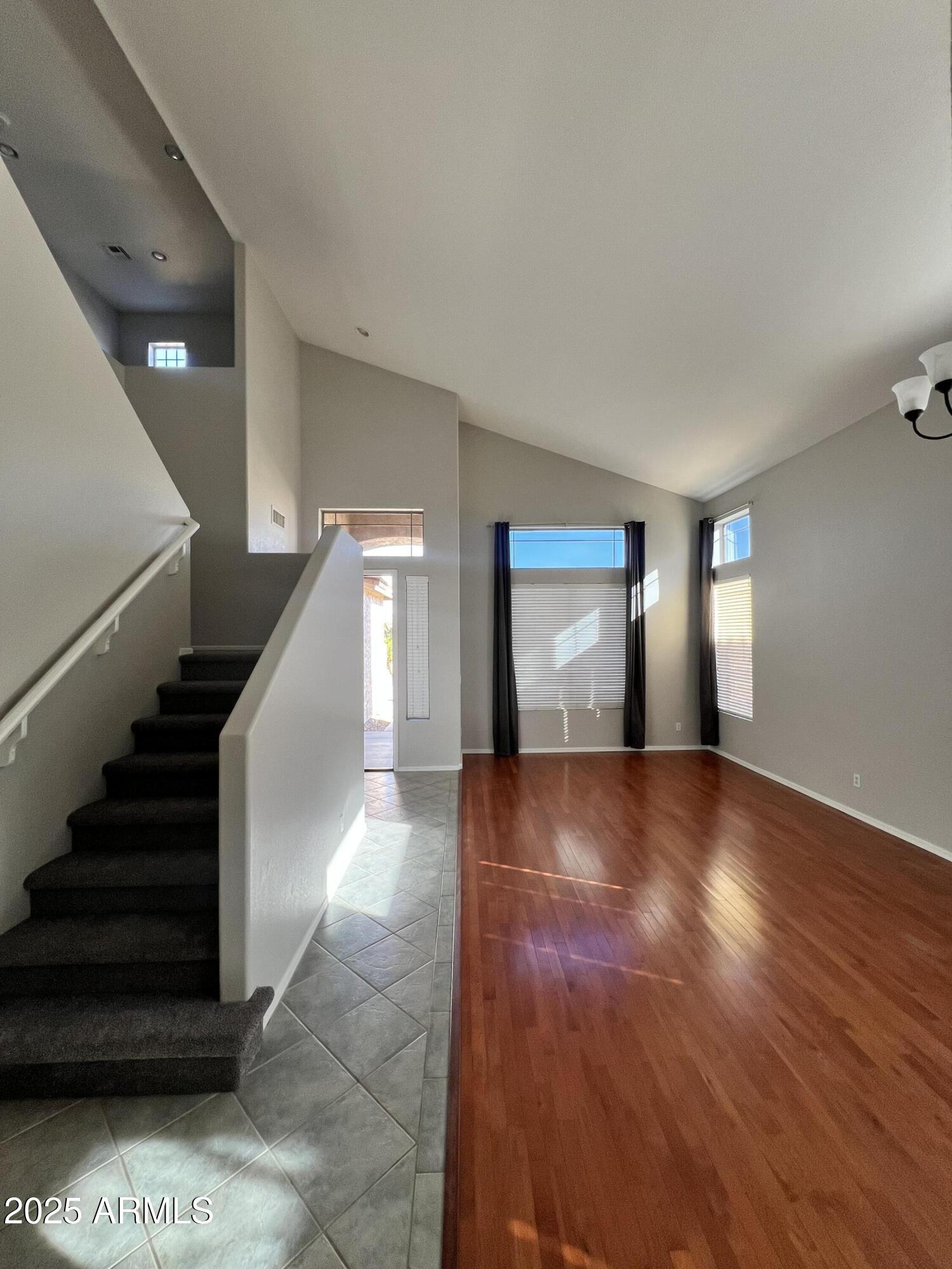 20582 North 92nd Lane Peoria, AZ 85382 - Photo 16 of 30 a view of entryway and hall with wooden floor