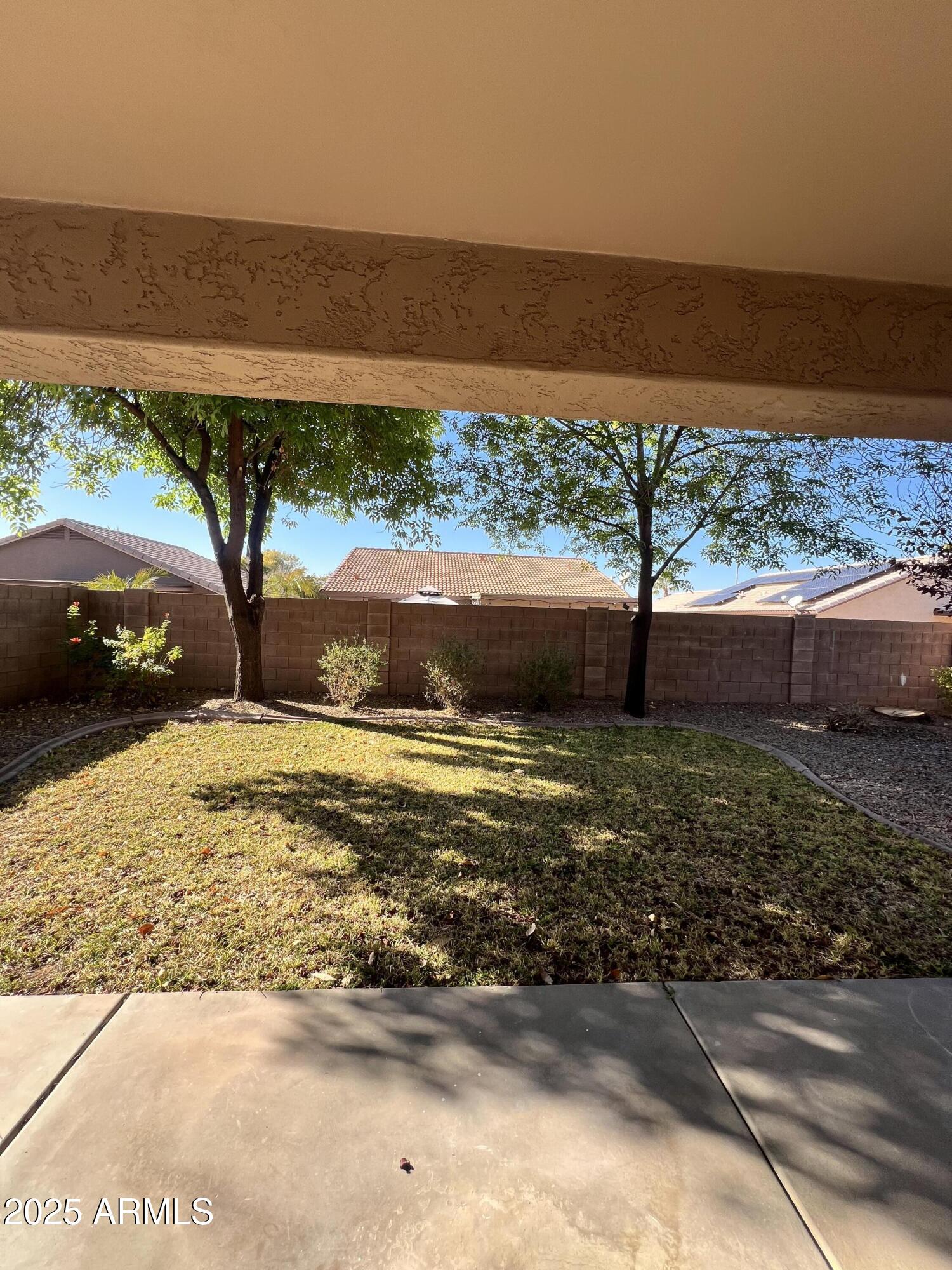 20582 North 92nd Lane Peoria, AZ 85382 - Photo 25 of 30 a view of a yard and ocean view