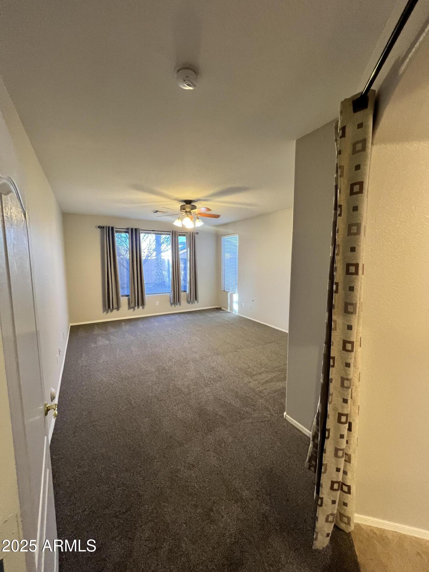 20582 North 92nd Lane Peoria, AZ 85382 - Photo 7 of 30 a view of livingroom and hardwood floor